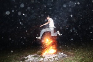boy jumping over fire