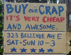 bargain sign "Buy our crap"