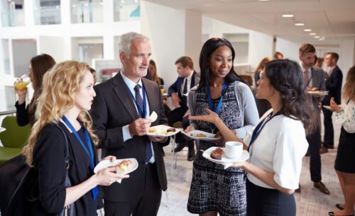 people networking at an event. 