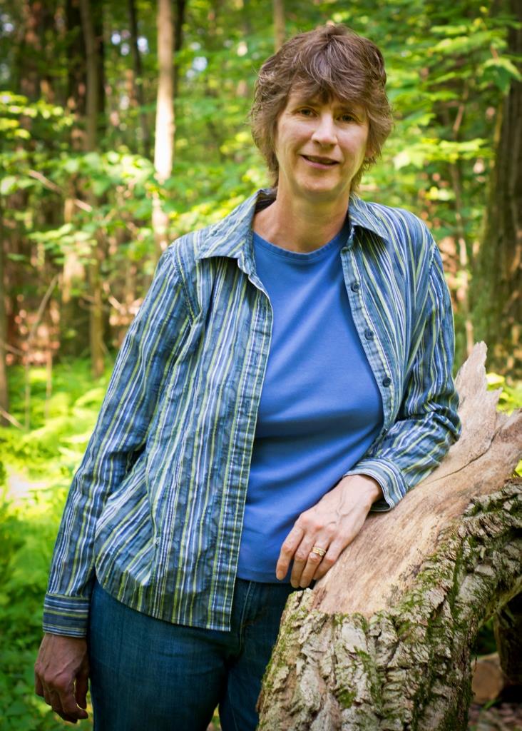 Lisa E. Betz casual with trees