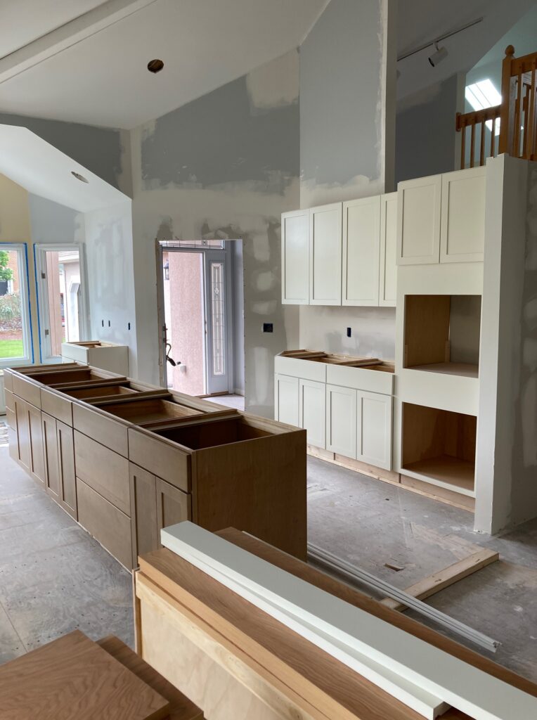 house renovation kitchen cabinets partially installed